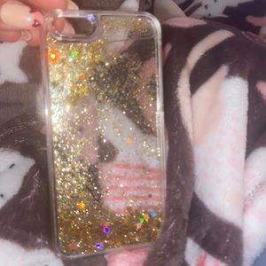 I phone 8 Gold star case, with moveable glitter. Also a hard shell case